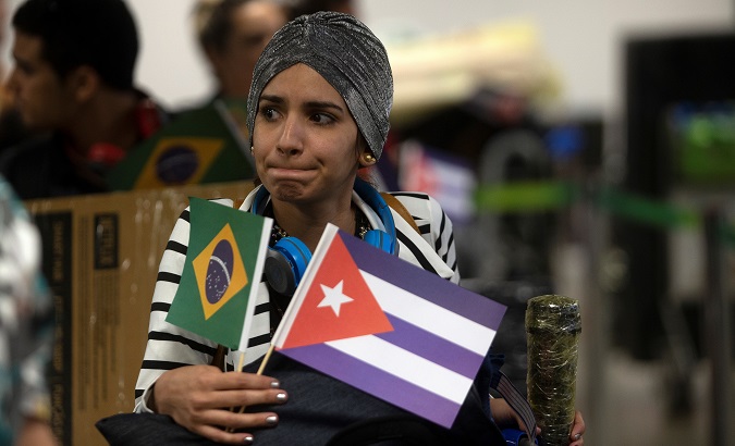 A Cuban doctor says goodbye to her patients at the Kubitschek Airport in Brasilia, Brazil, Nov. 22, 2018.