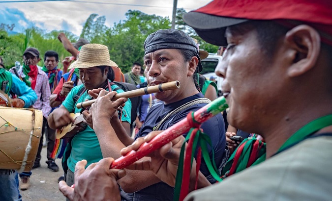 An musical group accompanies an Indigenous people's march in Valle del Cauca, Colombia, April 5, 2019.