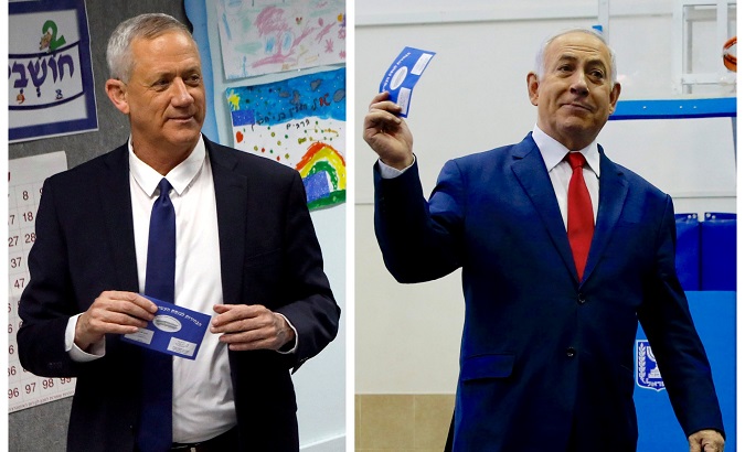 Benny Gantz (left), leader of Blue and White party and Israel’s Prime Minister Benjamin Netanyahu voting during Israel's parliamentary election April 9, 2019.