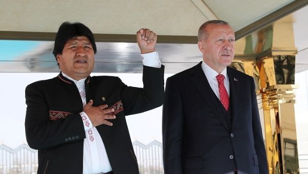 Turkey's President Erdogan and Bolivia's President Morales are seen during a welcoming ceremony at the Presidential Palace in Ankara.