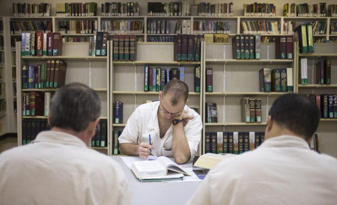 Prisoners at the Southwestern Baptist Theological Seminary library at the Texas Department of Criminal Justice men's prison.