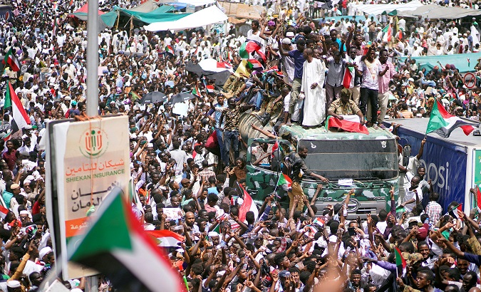 Sudanese demonstrators against a military-led transitional council in Khartoum, Sudan, April 12, 2019.