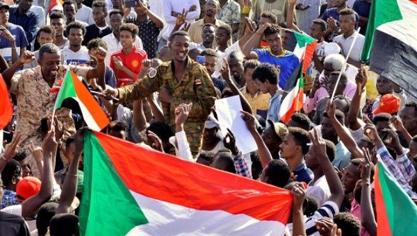 Sudan Lifts Curfew Amid Talks Between Military and Protesters