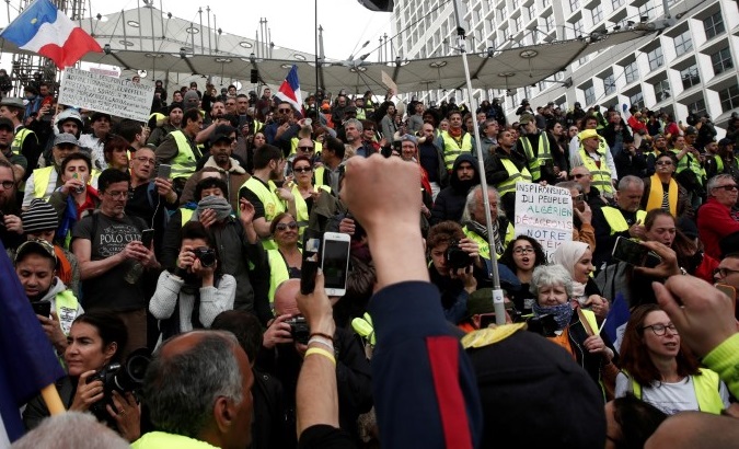 Yellow vests protesters attend a demonstration at La Defense financial district in Paris, France, April 6, 2019.