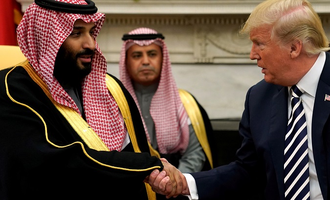 U.S. President Donald Trump and Crown Prince Mohamed Bin Salman (MBS) shaking hands.