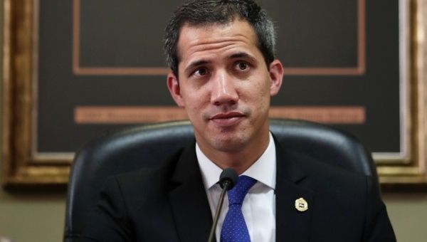 Venezuelan opposition leader Juan Guaido takes part in a meeting with members of the National Assembly in Caracas
