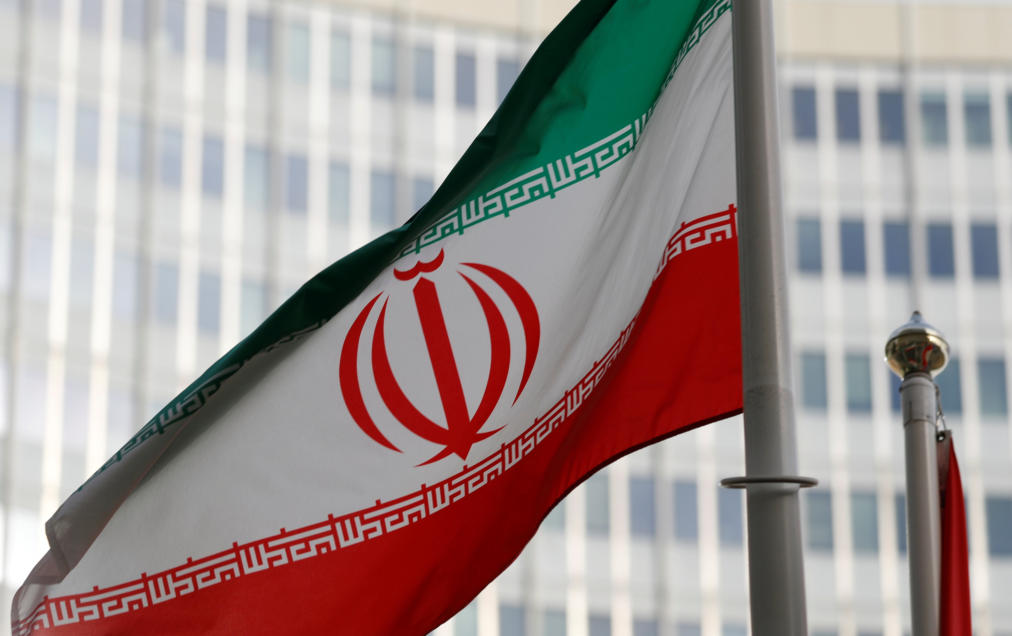 The Iranian flag flutters in front the International Atomic Energy Agency (IAEA) headquarters in Vienna, Austria March 4, 2019.