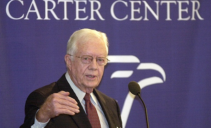 Former U.S. President Jimmy Carter makes remarks at a luncheon following a morning symposium for the 25th anniversary of the Camp David Peace Accords between Israel and Egypt.