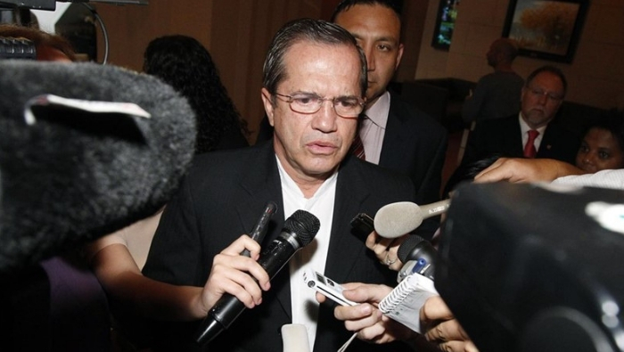 Former Ecuadorean Foreign Minister Ricardo Patino Saud speaks to reporters