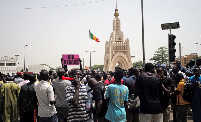 People gather to protest the government and international forces' failure to stem rising ethnic and jihadist violence, in the Malian capital of Bamako, Mali April 5, 2019.