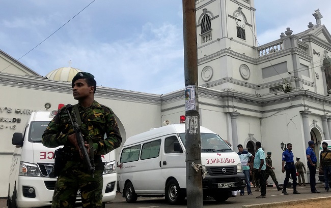 Sri Lankan military officials stand guard in front of the St. Anthony's Shrine, Kochchikade church after an explosion in Colombo, Sri Lanka April 21, 2019.