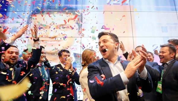Ukrainian presidential candidate Volodymyr Zelenskiy reacts following the announcement of the first exit poll in a presidential election at his campaign headquarters in Kiev, Ukraine April 21, 2019.
