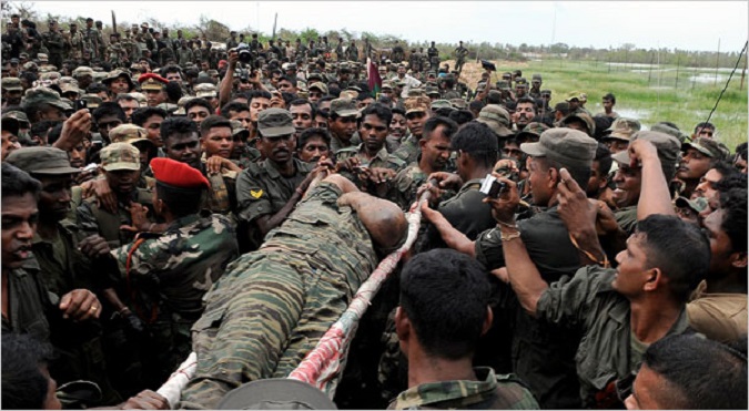 Sri Lankan army carrying the body of LTTE leader Velupillai Prabhakaran after a 26 year-old civil war between Tamils and Sinhalese.
