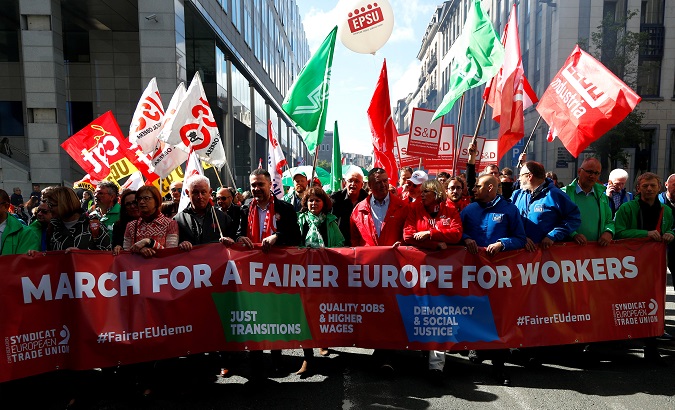 Protesters march to call for a 'fairer Europe for Workers', in Brussels, Belgium, April 26, 2019.