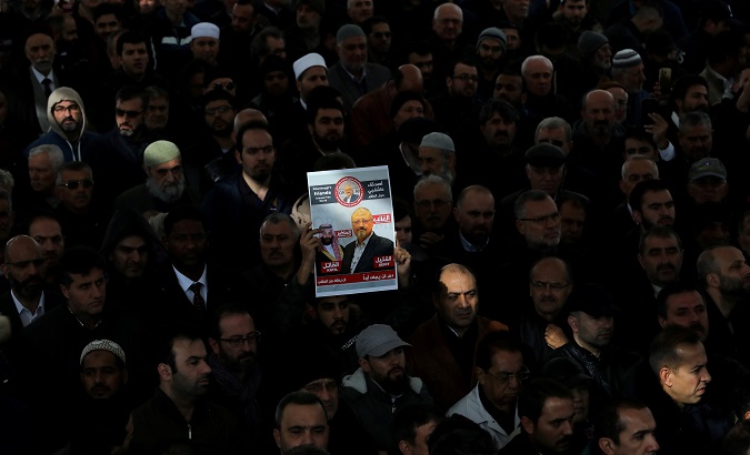 People attend a symbolic funeral prayer for Saudi journalist Jamal Khashoggi at the courtyard of Fatih mosque in Istanbul, Turkey Nov. 16, 2018.