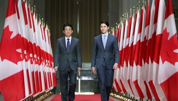 Japan's Prime Minister Shinzo Abe and Canada's Prime Minister Justin Trudeau arrive at a news conference in Ottawa, Ontario, Canada, April 28, 2019.