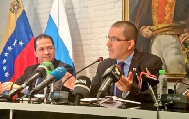 Arreaza answers questions after his meeting with Russian Foreign Minister Sergei Lavrov in Moscow.