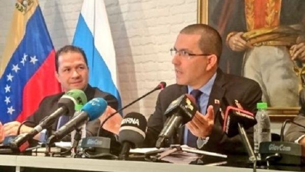 Arreaza answers questions after his meeting with Russian Foreign Minister Sergei Lavrov in Moscow. 
