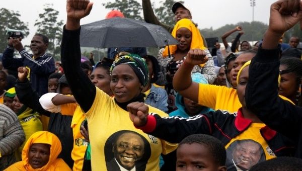 Supporters listen to South African President Cyril Ramaphosa (not pictured) during an African National Congress (ANC) election rally in Tongaat, near Durban, South Africa