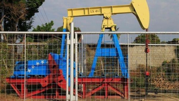 An oil pumpjack painted with the colors of the Venezuelan flag is seen in Lagunillas, Venezuela January 29, 2019. 