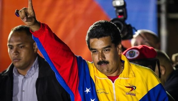 Nicolas Maduro at a political rally after his first electoral victory in Caracas, Venezuela, April 14, 2013.