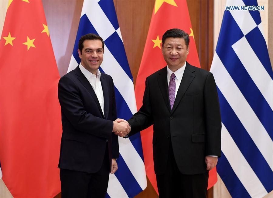 Greek Prime Minister Alexis Tsipiras pictured with China's Xi Jinping.