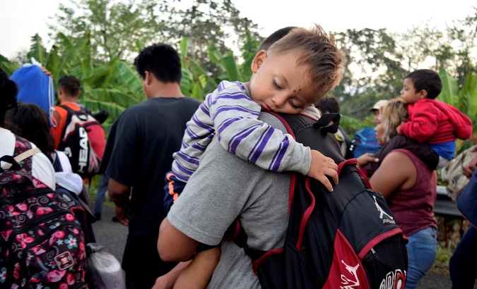 A child rests as a group of migrants travel through Mexico towards the U.S. southern border.