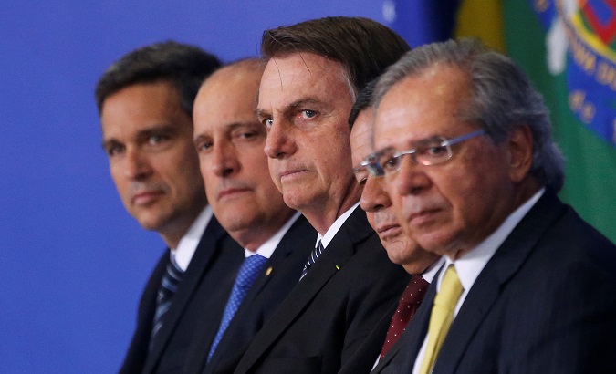 President Bolsonaro (C), Central Bank President Campos Neto, Chief of Staff Lorenzoni, Vice President Mourao and Economy Minister Guedes in Brasilia, Brazil, April 24, 2019.