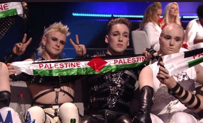 Eurovision contestants from Iceland Hatari holding Palestine banners in protest of Israel's occupation of the Palestinian territories.