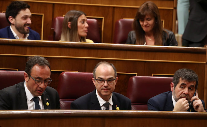 Jailed Catalan politicians Jordi Sanchez, Josep Rull and Jordi Turull attend the first session of parliament following a general election in Madrid, Spain, May 21, 2019.
