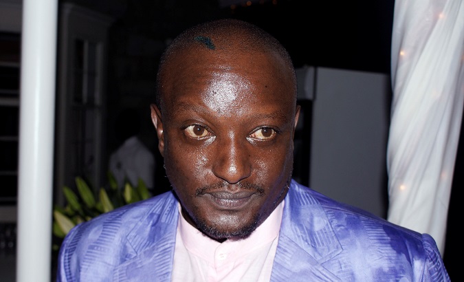 Kenyan writer Binyavanga Wainaina, who challenged stereotypes of Africa with biting satire and took on prejudice by documenting his life as an openly gay man, is seen at his an event in Nairobi.