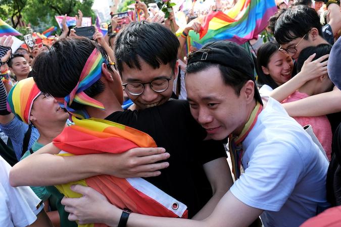 Supporters of same-sex marriage at a rally during a parliament vote on three draft bills of a same-sex marriage law, outside the Legislative Yuan in Taipei, Taiwan May 17, 2019.