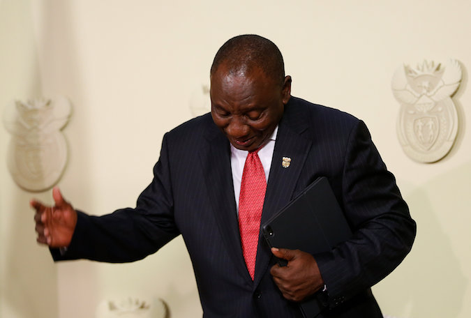 South Africa's President Cyril Ramaphosa reacts during the announcement of the new cabinet in Pretoria, South Africa May 29, 2019.