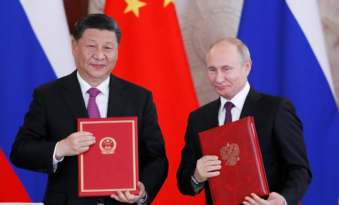 Russian President Vladimir Putin meets his Chinese counterpart Xi Jinping in Moscow.