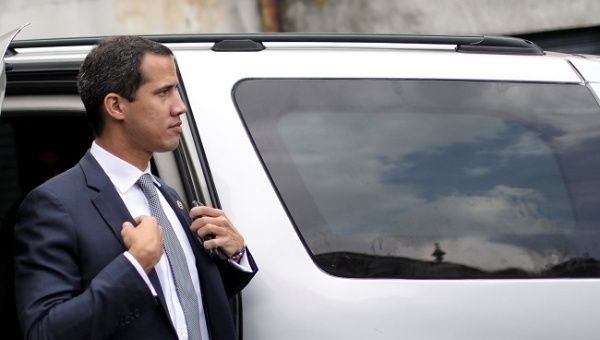 Venezuelan opposition leader Juan Guaido arrives in Caracas for a news conference.