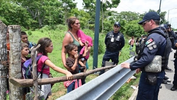 Mexican police speaking to Central American migrants in Tapachula, state of Chiapas, Mexico, June 5, 2019.
