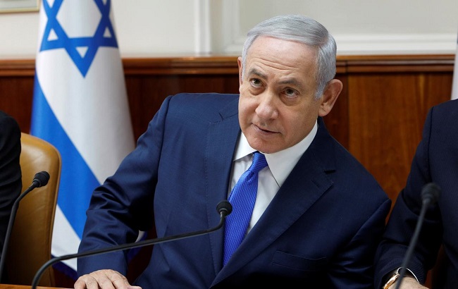 Israeli Prime Minister Benjamin Netanyahu attends the weekly cabinet meeting at his Jerusalem office December 2, 2018