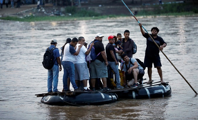 Central American migrants cross the Suchiate river from Tecun Uman, in Guatemala, to Ciudad Hidalgo, Mexico, June 10, 2019.