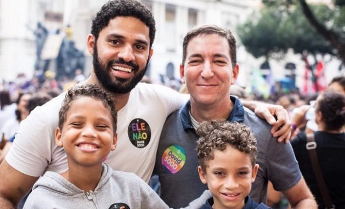 David Miranda (L), Glenn Greenwald (R) and their children in Rio de Janerio, Brazil.