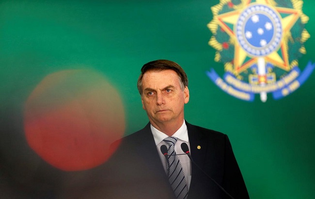 Brazil's President-elect Jair Bolsonaro attends a joint news conference with Brazil's President Michel Temer (not pictured) at the Planalto Palace in Brasilia, Brazil November 7, 2018.