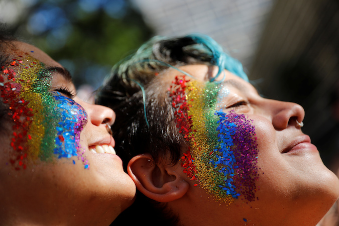 Revellers participate in the Gay Pride parade along Paulista Avenue in Sao Paulo, Brazil, June 23, 2019.