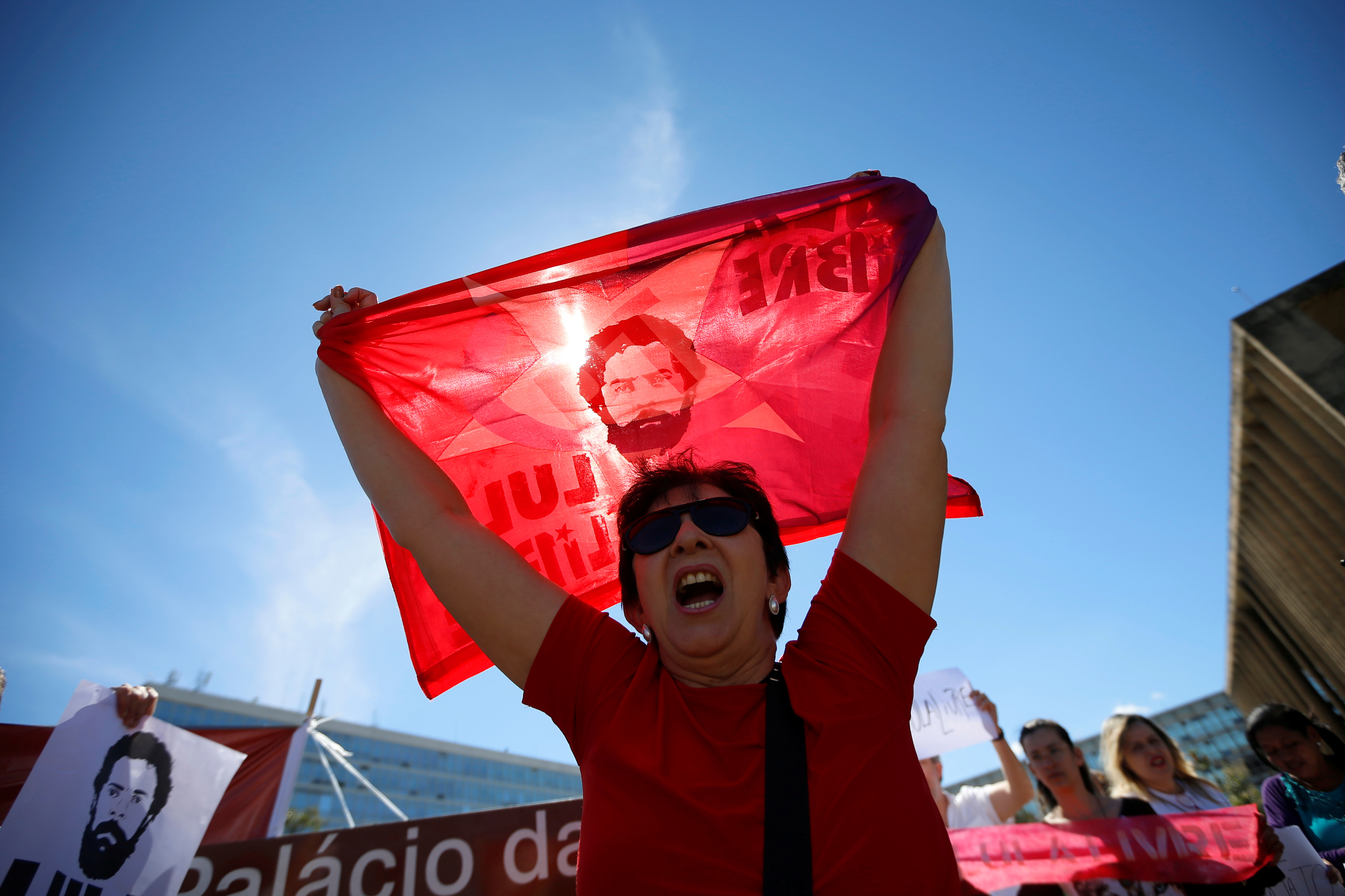 A supporter of Brazil's former President Luiz Inacio Lula da Silva attends a protest against the Brazil's Justice Minister Sergio Moro in front the Justice Ministry headquarters in Brasilia, Brazil June 10, 2019.