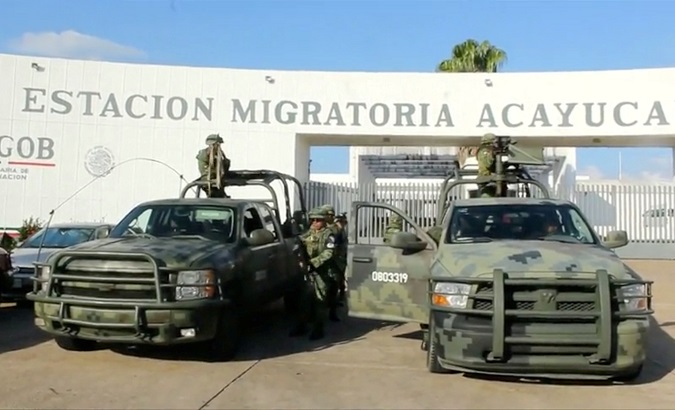 Soldiers stand guard outside the National Migration Institute in the state of Veracruz, Mexico, June 15, 2019.