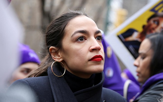 Alexandria Ocasio-Cortez (D-NY) looks on during a march organized by the Women's March Alliance in the Manhattan borough of New York City, U.S., January 19, 2019.