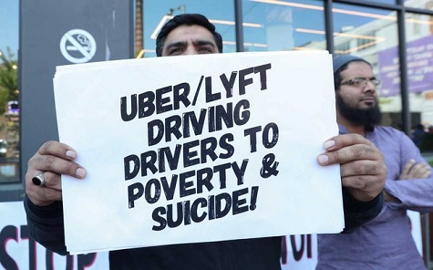A driver takes part in a protest against Uber and other app-based ride-hailing companies.