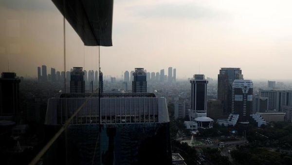 Indonesian government offices are seen as smog covers the capital city of Jakarta, Indonesia, July 4, 2019.