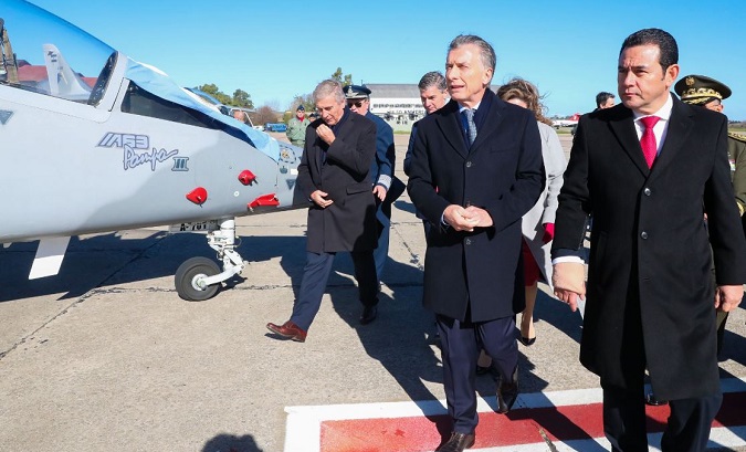Argentinian President Mauricio Macri (l) and Guatemalan President Jimmy Morales during sale of 2 Pampa III airplanes to Guatemala, Buenos Aires. July 3, 2019.