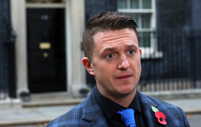 Far right activist Stephen Yaxley-Lennon, who goes by the name Tommy Robinson, speaks outside 10 Downing Street , November 6, 2018.