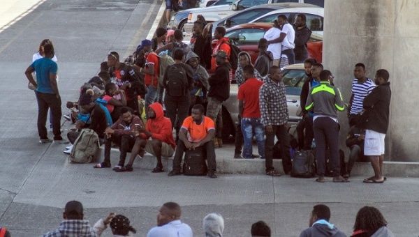 Caribbean and African migrants at El Chaparral international crossing in Tijuana, Mexico, July 9, 2019.