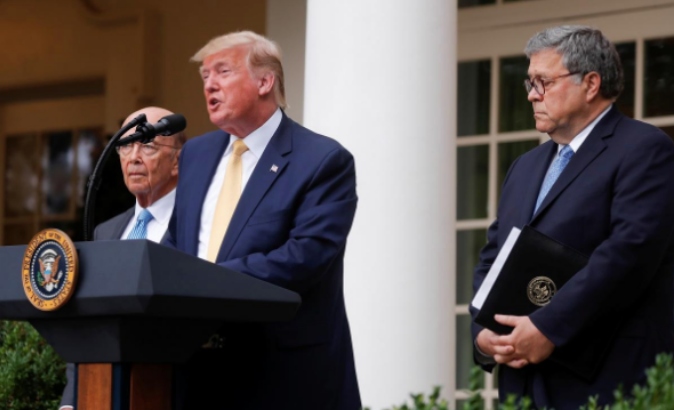 U.S. President Donald Trump (center) spoked at the Rose Garden in Washington Thursday, July 11, 2019.